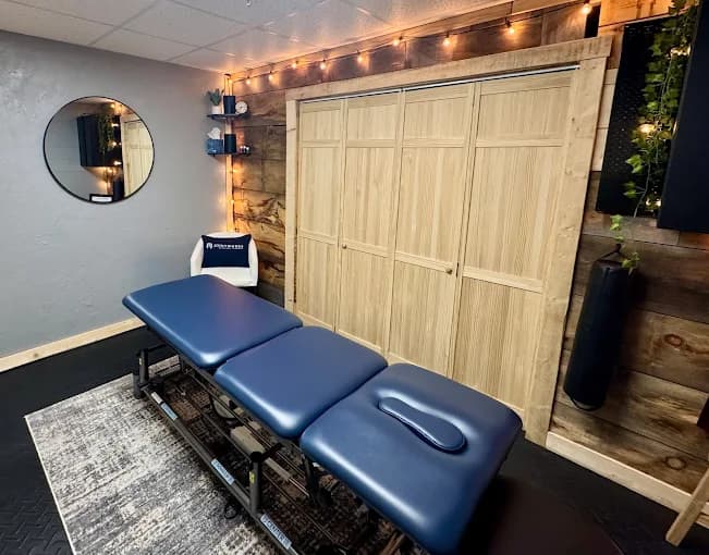 JointWorks PT clinic space with treatment table and equipment